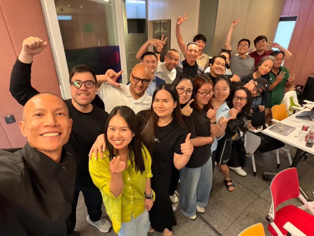 The Edge8 team taking a selfie together in the office